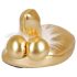 Goldene Pantoffeln mit Penis-Motiv